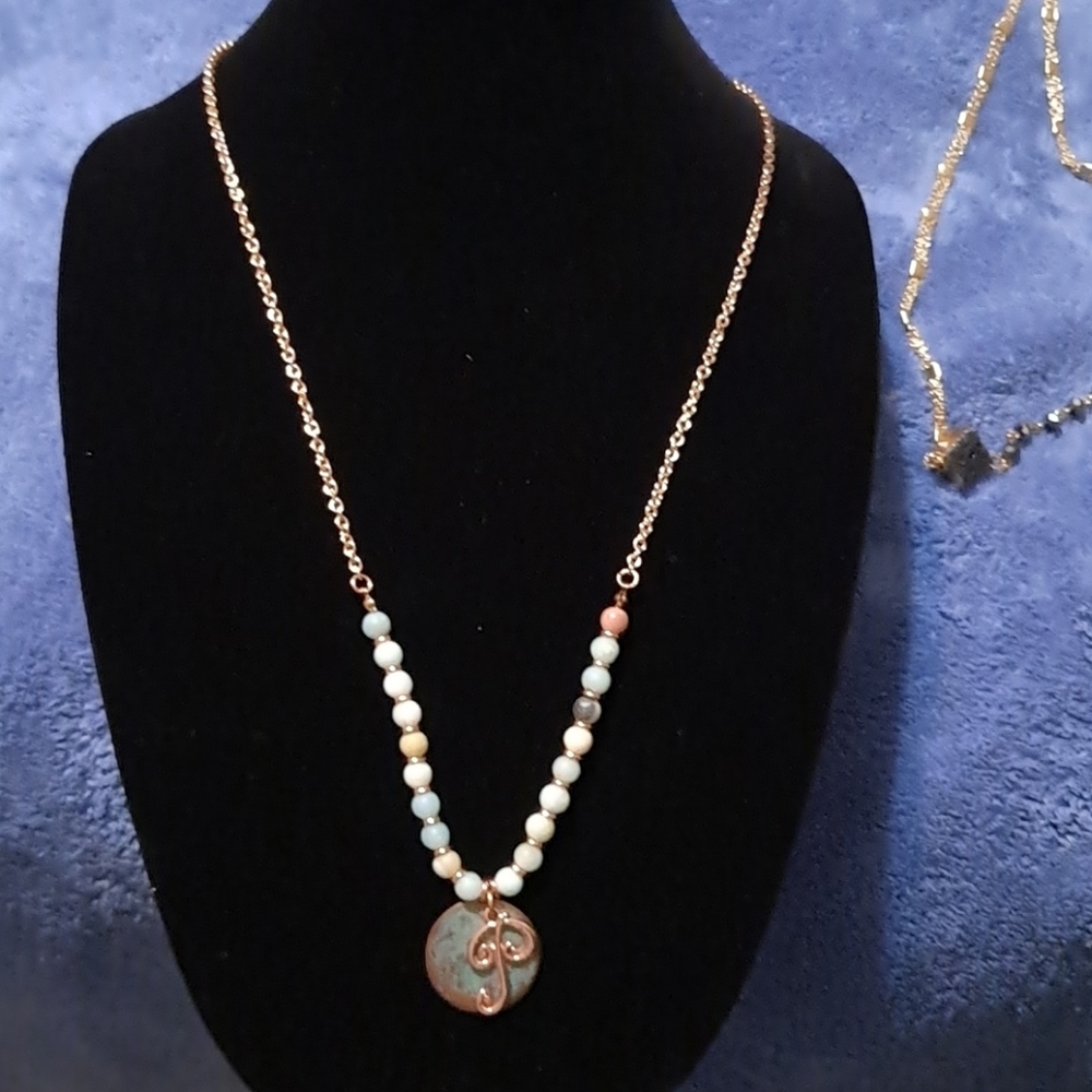 Gold necklace with P initial